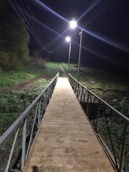 Новый мост и фонари появились в деревне Искра Дновского района