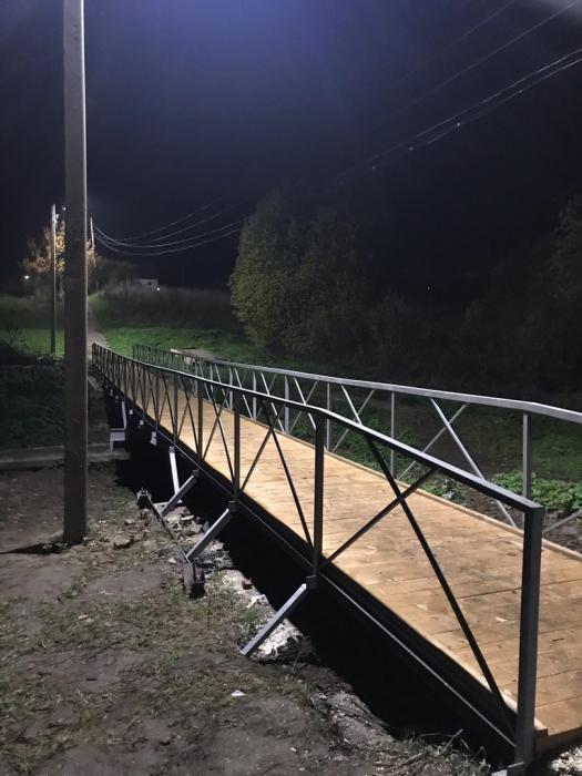 Новый мост и фонари появились в деревне Искра Дновского района