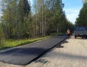 Укладка асфальта началась на участке Плюхново – Кудряницы в Куньинском районе